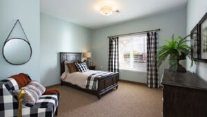 Furnished private bedrooms with ADA approved bathrooms