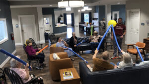 Residents play a fun Balloon Game